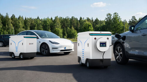 Últimas noticias de la empresa sobre Resolviendo el enigma de la carga en los estacionamientos: ¿Cómo localizan nuestros robots móviles automáticamente los vehículos para recargarlos cuando se produce 